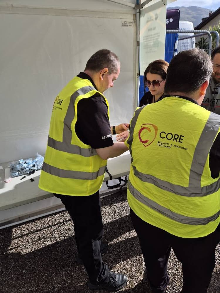 Core Security and Training staff in branded hi-vis working an event in Scotland